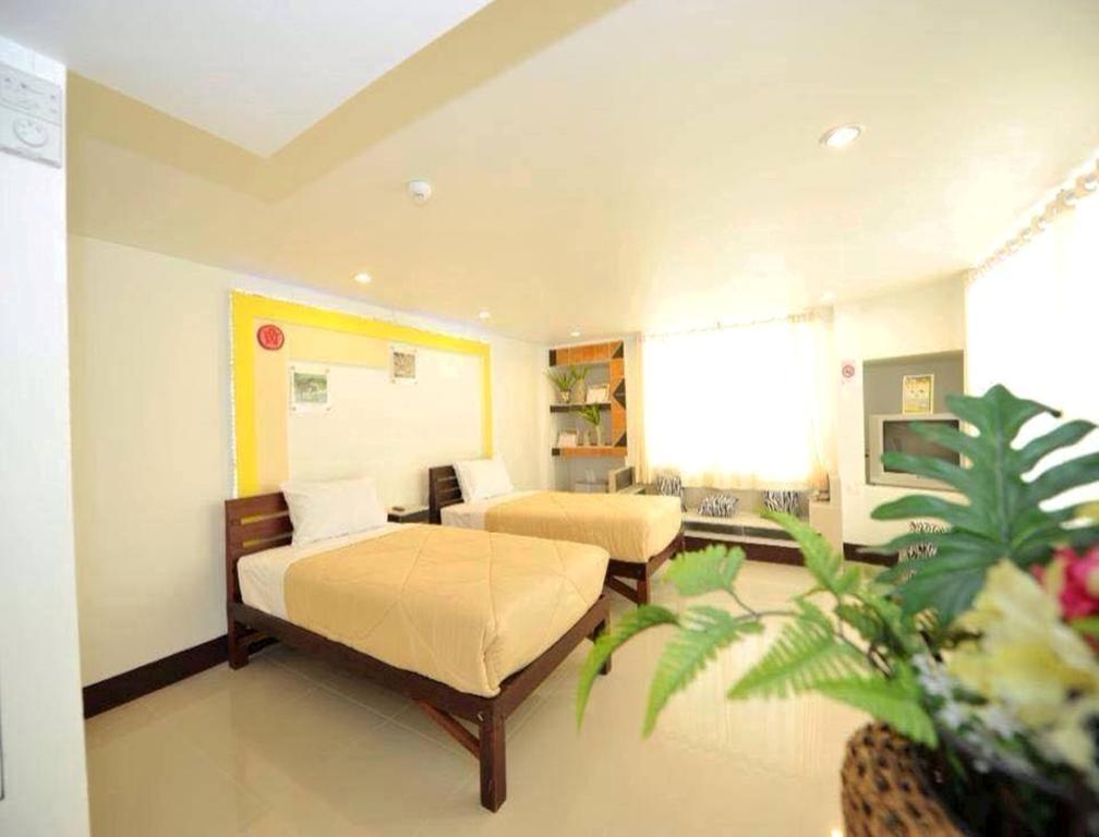 Win Hotel Phayao Quarto foto